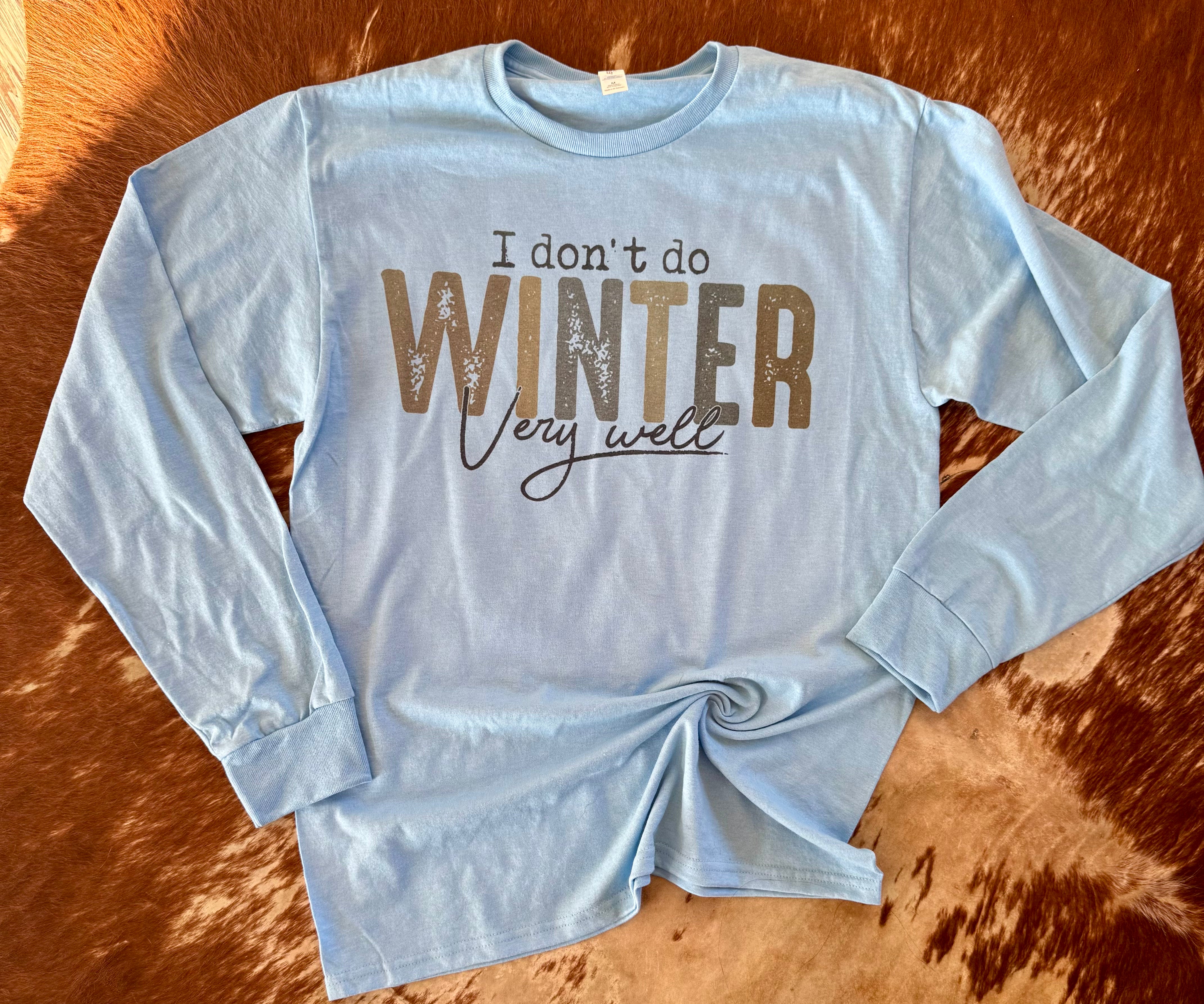 Lt blue long sleeve “I don’t do winter” graphic tee