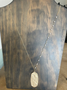 Hammered gold pendant w/ pearl chain