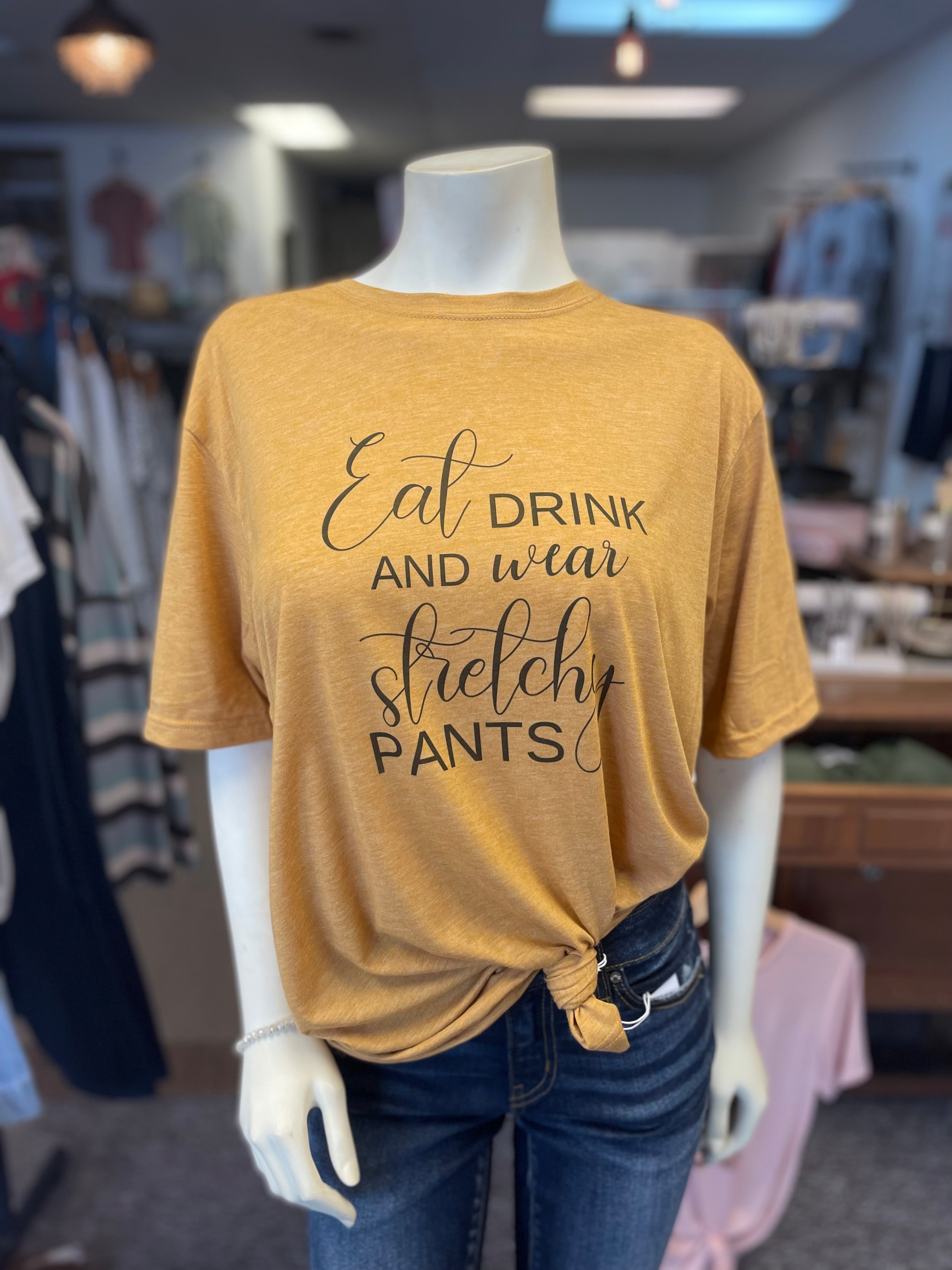 Mustard eat drink and wear stretchy pants tee